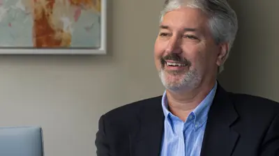 A businessman smiling